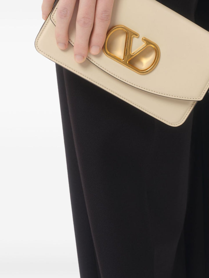 Valentino Garavani Vain small leather clutch