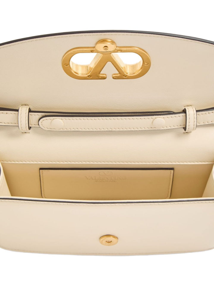 Valentino Garavani Vain small leather clutch