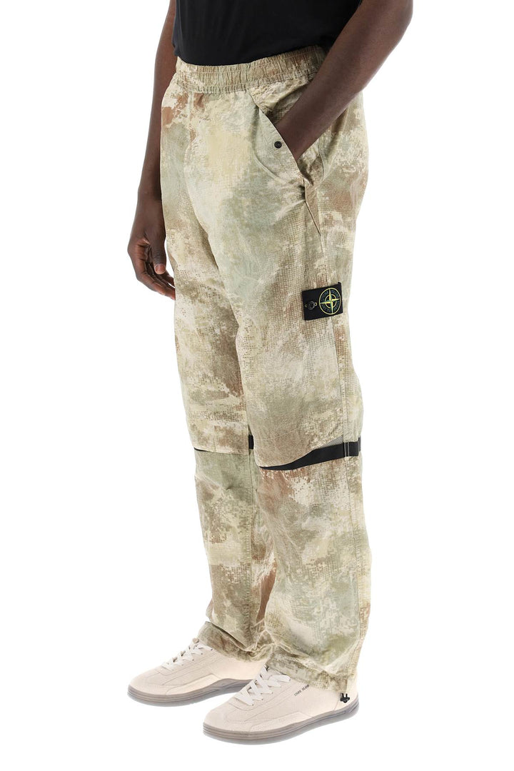 Stone Island econyl printed dissolving grid camo pants