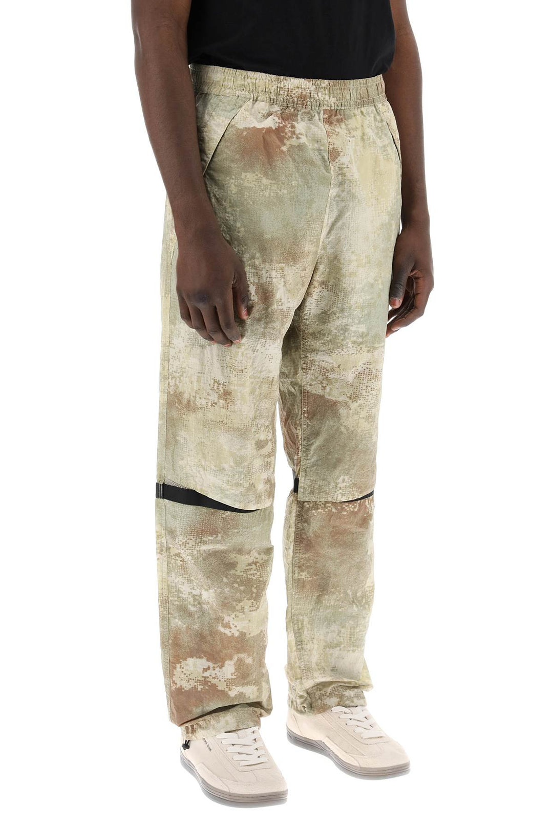 Stone Island econyl printed dissolving grid camo pants