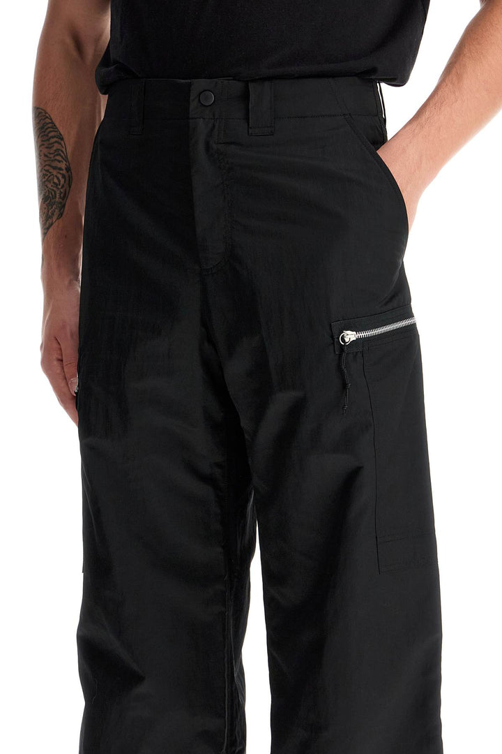 OUR LEGACY tactical cargo pants in technical satin fabric