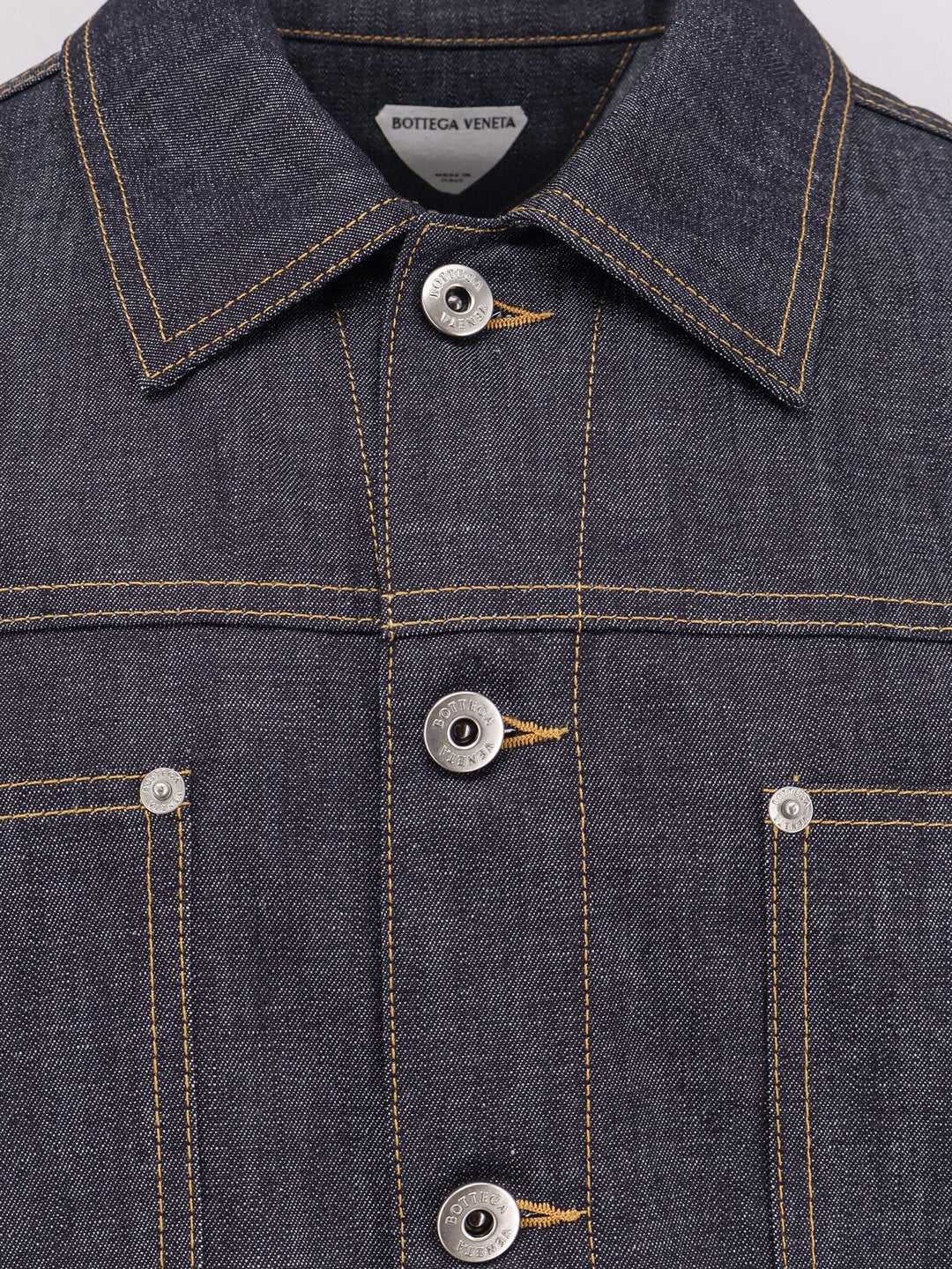Denim jacket with iconic Intrecciato patch