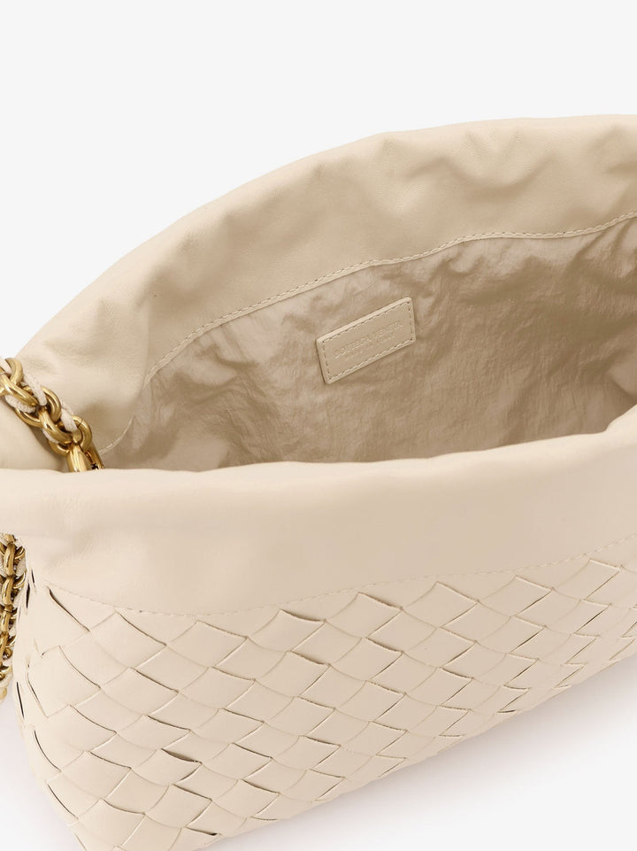 Dustbag leather pouch with Intrecciato motif