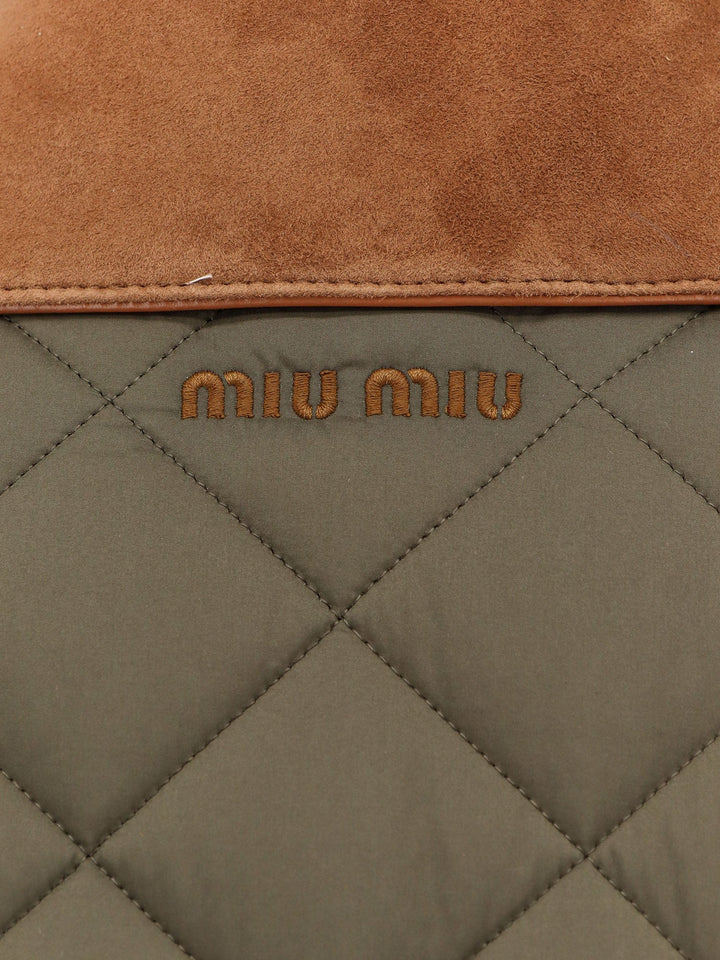 Quilted nylon jacket with suede details