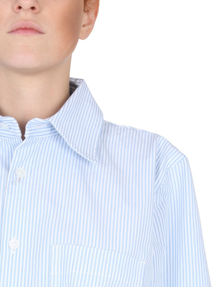SHIRT WITH CURVED BACK