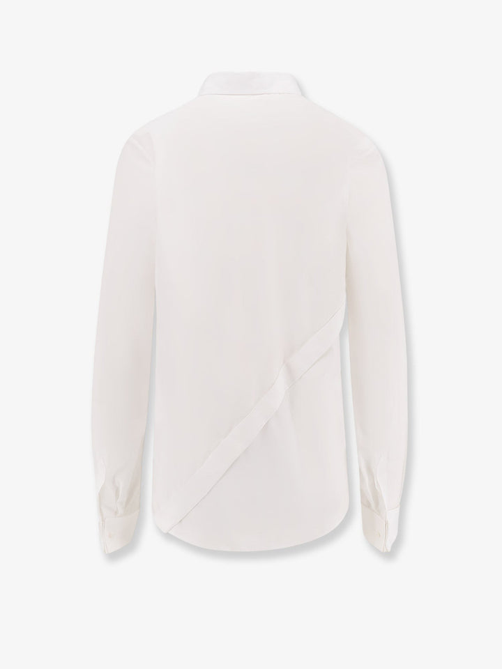 Shirt with oblique closure