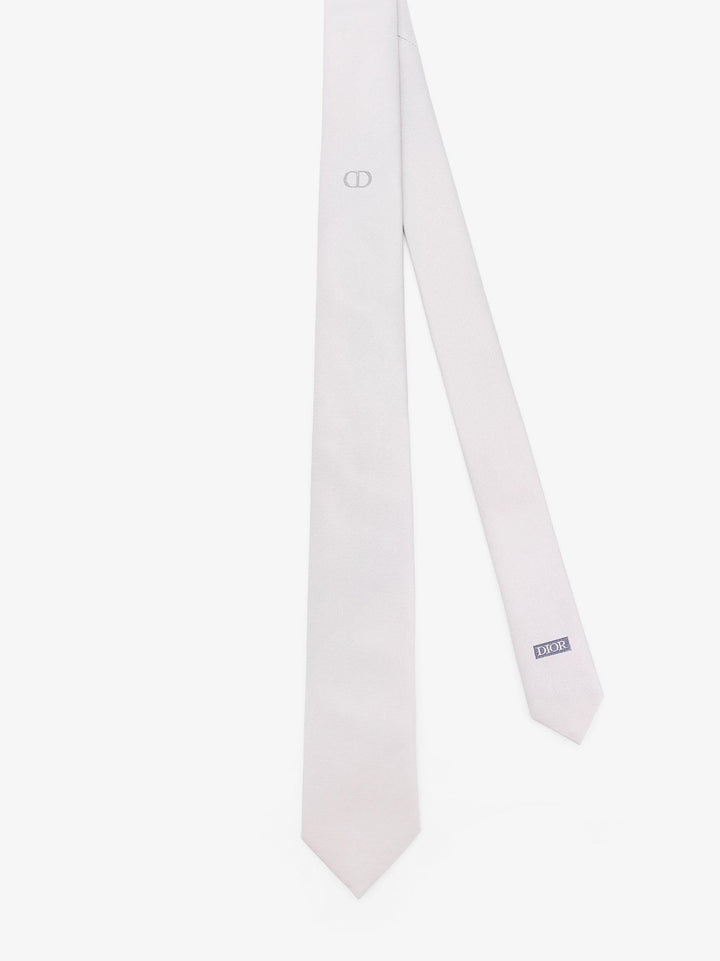 Silk tie with embroidered logo monogram
