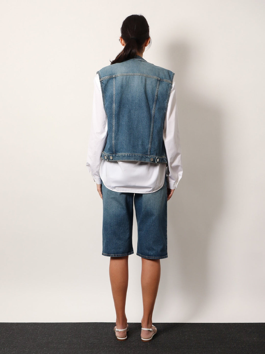 Stone washed denim sleeveless jacket