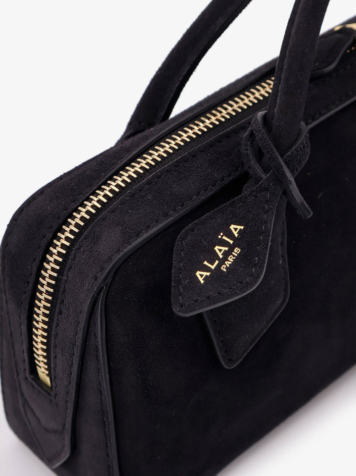 Teckel Clutch suede handbag