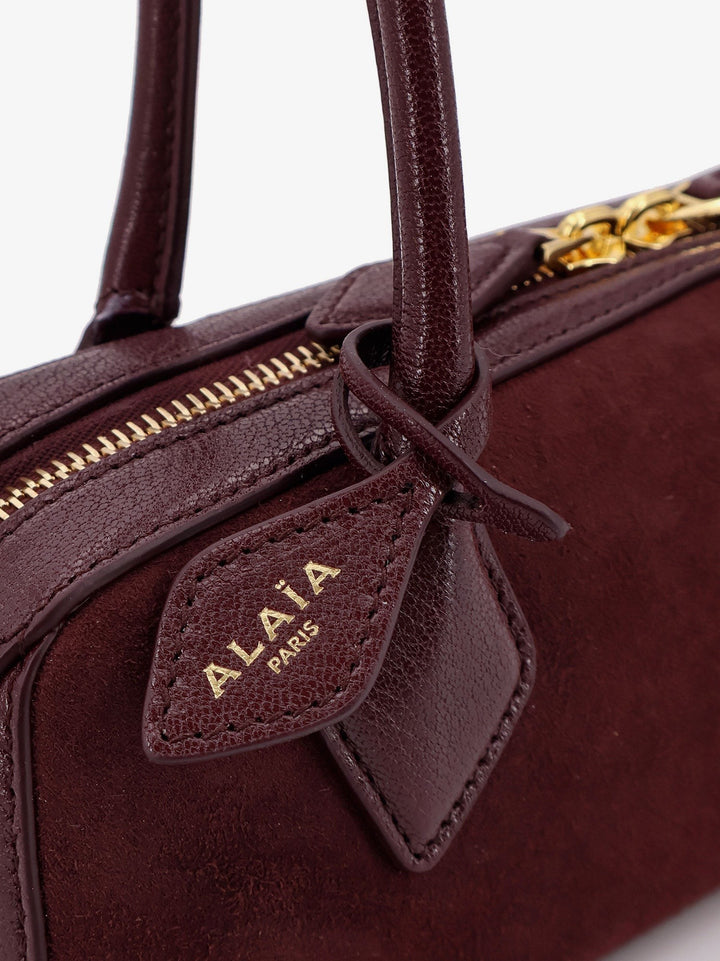 Teckel Small suede shoulder bag