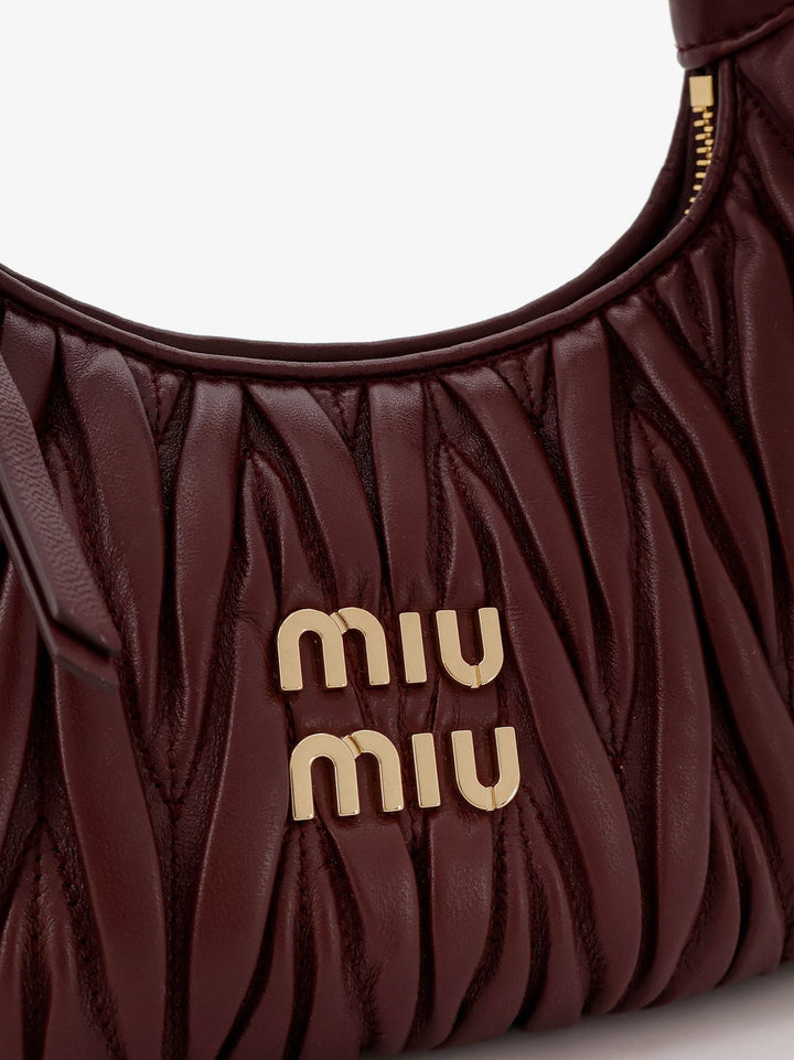 Wander matelassé leather shoulder bag