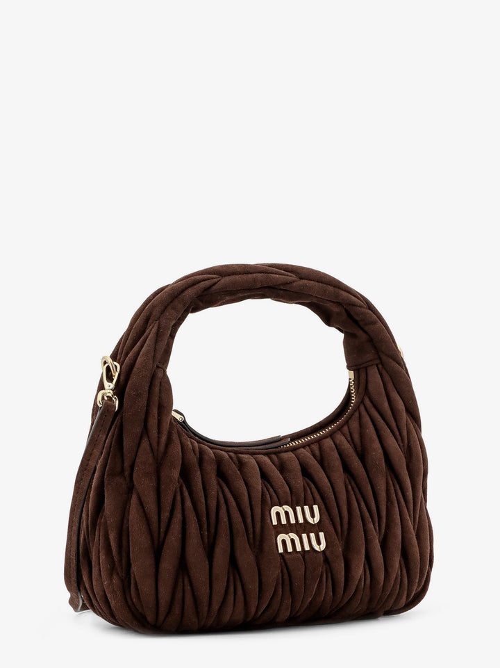 Wander matelassé suede shoulder bag