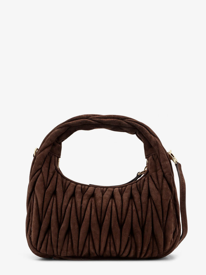 Wander matelassé suede shoulder bag